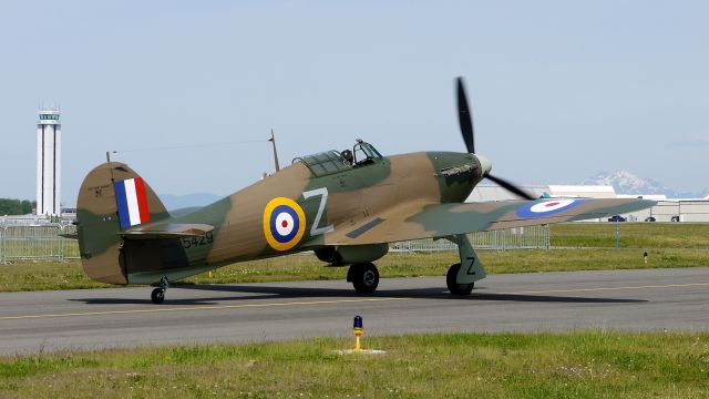 N54FH — - Flying Heritage Collections Hawker Hurricane Mk XIIA (Ser #CCF/R32007) taxis to Rwy 34L for a Battle of Britain Commemorative flight on 5/9/15.