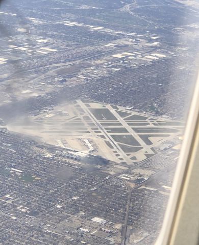 Canadair Regional Jet CRJ-200 (N467AW) - A United Express CRJ-200 on approach to Chicago O'Hare International Airport (KORD) flying over Chicago Midway Airport (KMDW) while arriving from Harrisburg International Airport (KMDT) on April 1, 2021.