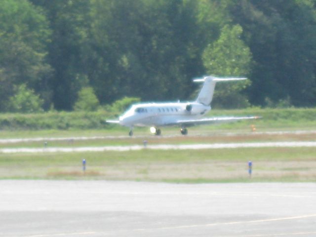 Cessna Citation III (N232CE) - Rolling out on runway 14.