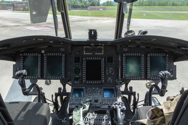 1008808 — - Army National Guard CH47F cockpit at lunken. 5 Chinooks came in from CAK for a lunch stop while making their way down to Fort Hood to deploy to Iraq. Coincidentally they arrived there on Independence Day!