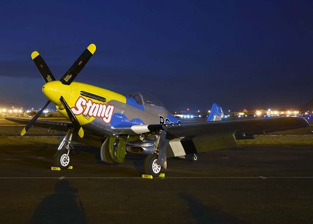 NL151RJ — - Stang on the flightline at night.