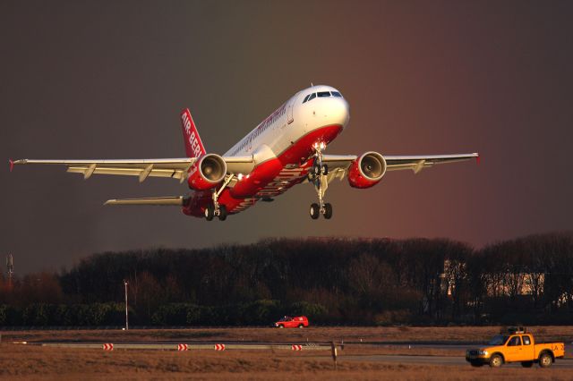 Airbus A320 (D-ALTF) - Takeoff after the storm.