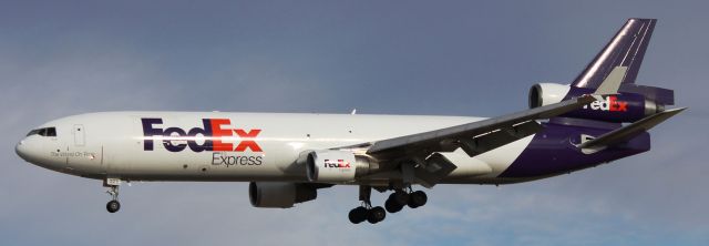 Boeing MD-11 (N523FE) - Landing on 35L.