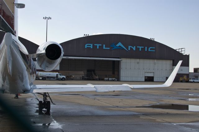 — — - Looking though the fence by the IX Center at CLE.  Private jet, I believe.