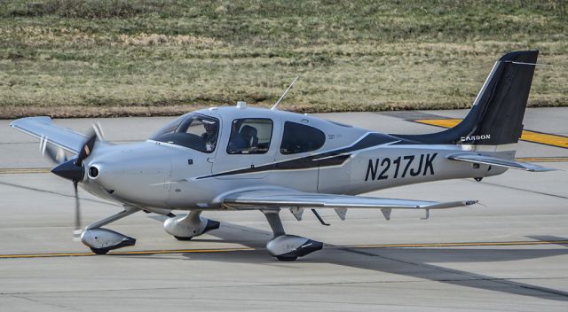 Cirrus SR-22 (N217JK) - N217JK taxiing back to its hangar on the other side of the airport.