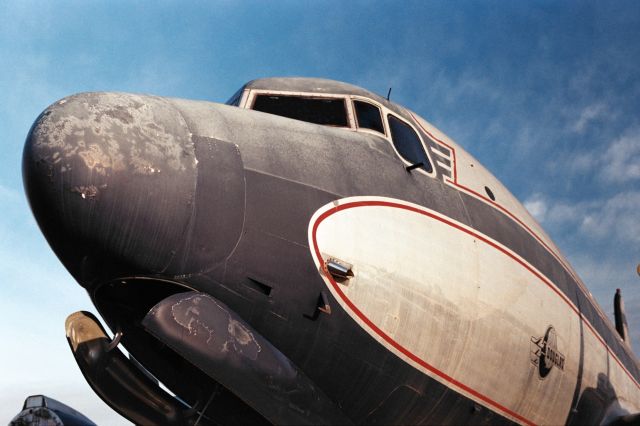 Douglas C-54 Skymaster — - DC-4 I believe is still sitting in Douglas, GA. This is a 35mm photo taken about 5 years ago.