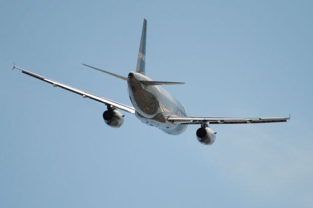 — — - At the National Rental Car outlet; lucky enough to have take-offs going directly overhead!