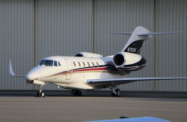 Cessna Citation X (N795HG) - KMRY - Monterey Jet Center ramp N795HG sporting a new paint job - - ATT Pro Am Gold week 2015