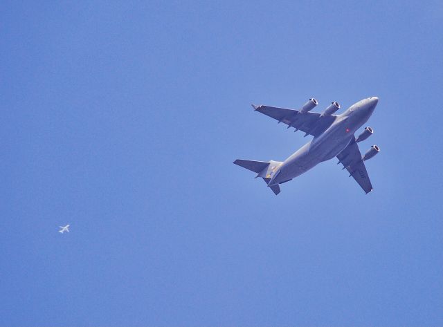 Embraer 170/175 (N656RW) - A Republic E170 flying high overhead as a C-17 passes below.  Both headed to CHS.  3/26/21