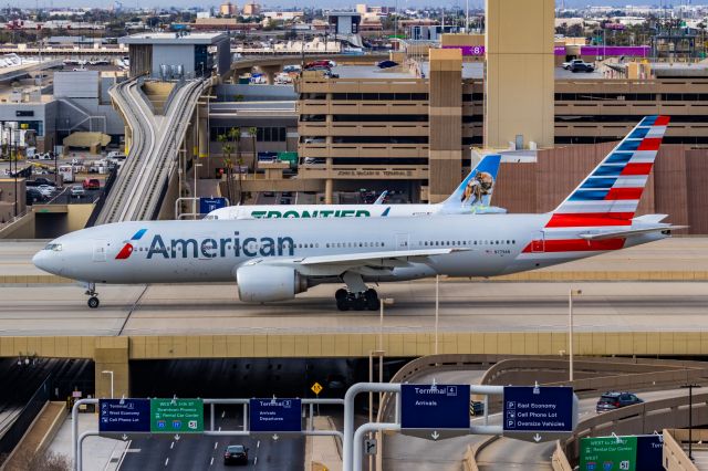 Boeing 777-200 (N779AN) - An American Airlines 777-200 taxiing at PHX on 2/13/23, the busiest day in PHX history, during the Super Bowl rush. Taken with a Canon R7 and Canon EF 100-400 II L lens.