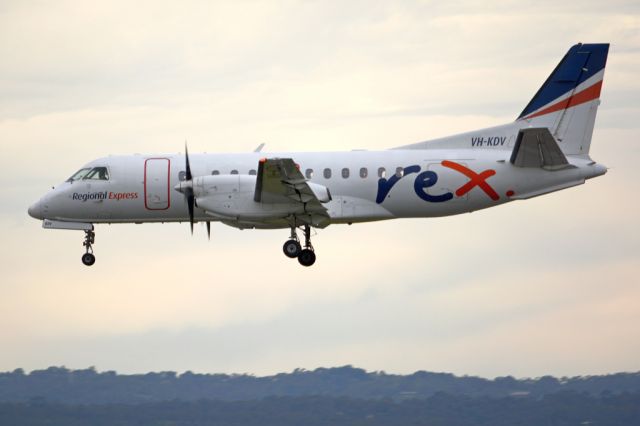 Saab 340 (VH-KDV) - On short finals for runway 05. Thursday, 19 June 2014.