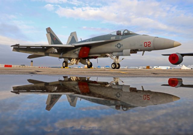 McDonnell Douglas FA-18 Hornet (16-5788) - The asphalt was hard on the ole’ knees but I had to get this reflection of a sharp looking Boeing F/A-18E Super Hornet from Naval Reserve VFC-12 Ambush Squadron, the “Fighting Omars”, based at NAS Oceana early Saturday, 16 Jul 2022.