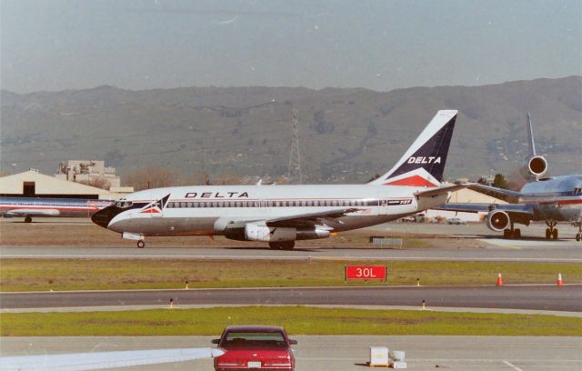 Boeing 737-200 (N334DL) - KSJC - early 1990s - Delta 737-200 powering up on 30L for Salt Lake City with the 1pm 'merry go round' in full swing...