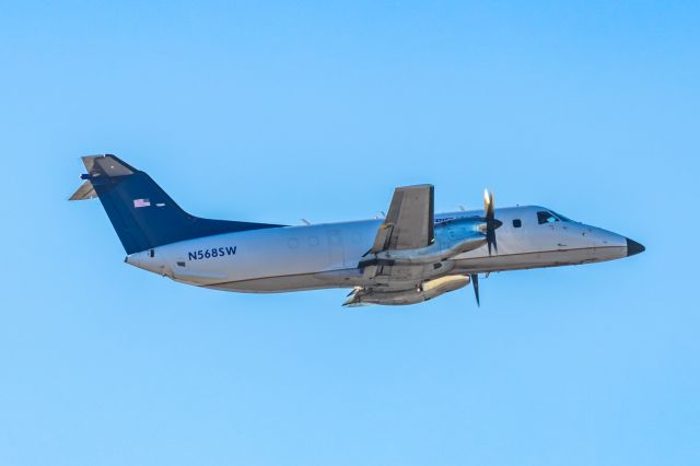 Embraer EMB-120 Brasilia (N568SW) - An Ameriflight Embraer 120 Brasilia taking off from PHX on 1/23/23. Taken with a Canon R7 and Tamron 150-600 G2 lens.