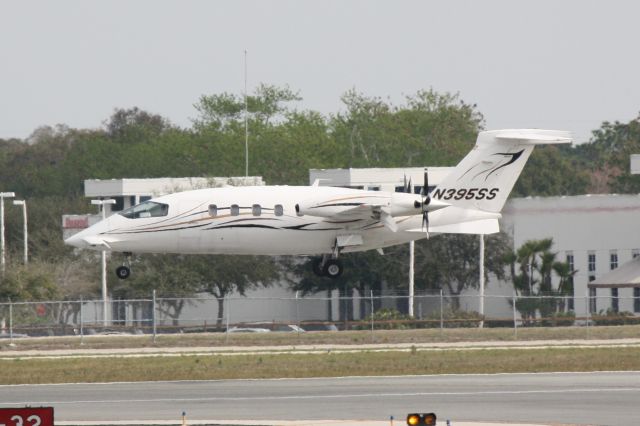 Piaggio P.180 Avanti (N395SS) - Avantair Flight 395 (N395SS) arrives on Runway 32 at Sarasota-Bradenton International Airport following a flight from Savannah/Hilton Head International Airport