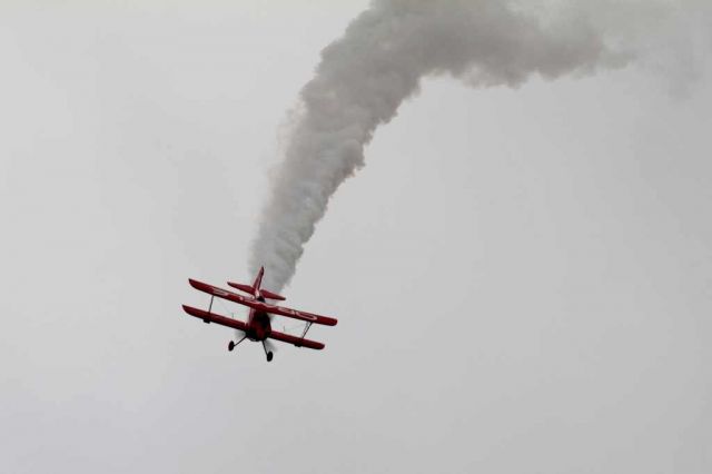 — — - Sean D. Tucker performing at the 2013 Planes of Fame airshow in Chino, CA.