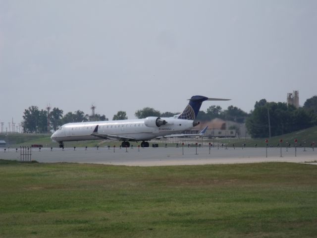 Canadair Regional Jet CRJ-700 (N155GJ) - GoJet CRJ lining up at KSTL, taken in 2015.