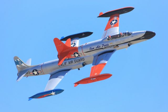 Lockheed T-33 Shooting Star (N377JP) - The Planes of Fame's CT-133 Mk 3PT Silver Star makes a pass in formation with Palm Springs Air Museum's T-33B Shooting Star at the Planes of Fame Airshow 2019..