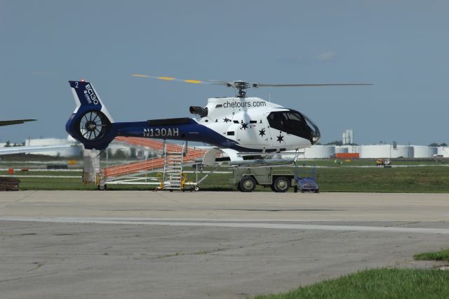 Eurocopter EC-130 (N130AH) - Watching takeoff from West Cargo ramp at Gary Regional.