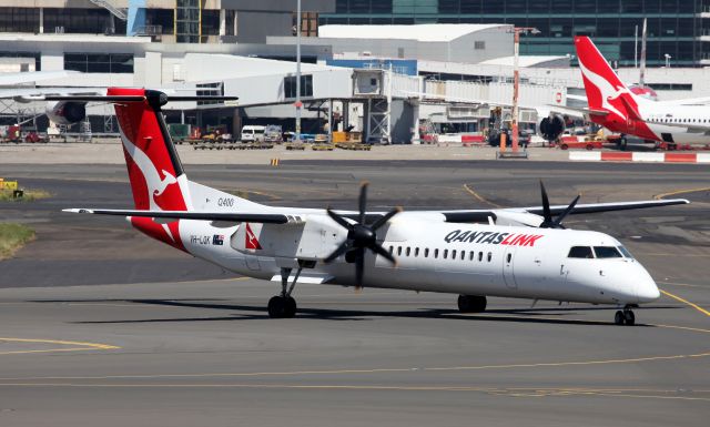 VH-LQK — - Taxi-ing To T2 On Starboard Prop