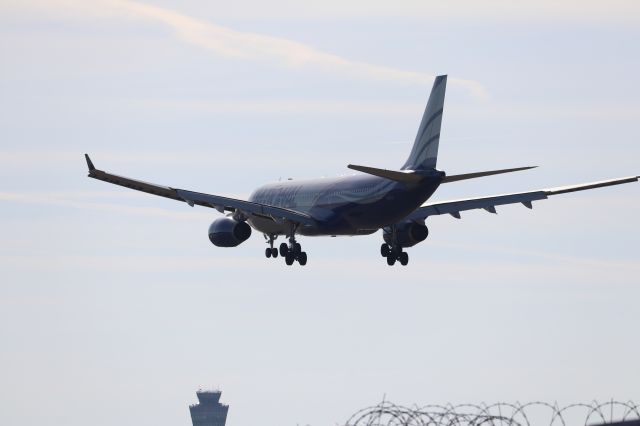 Airbus A330-200 (N819CA) - National Airlines A330-200 thunders into Indy on a rare 23L approach. Love the A330 landing gear!