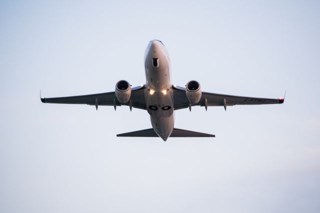 Boeing 737-700 (C-FTWJ) - WJA737 taking off from CYXU London 