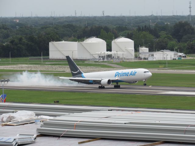 BOEING 767-300 — - An Amazon Prime 767 lands at Tampa. The short term parking garage offers a great view of the runways.  