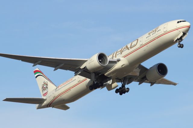 Boeing 777-200 — - An Eithad B777-300ER departs runway o09R at LHR.