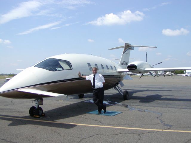 Piaggio P.180 Avanti (N109MS) - Russell Gehrke Chief Pilot in front of his office