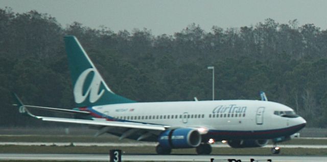 Boeing 737-700 (N272AT) - Just before the nose touches down on 02/11/2011