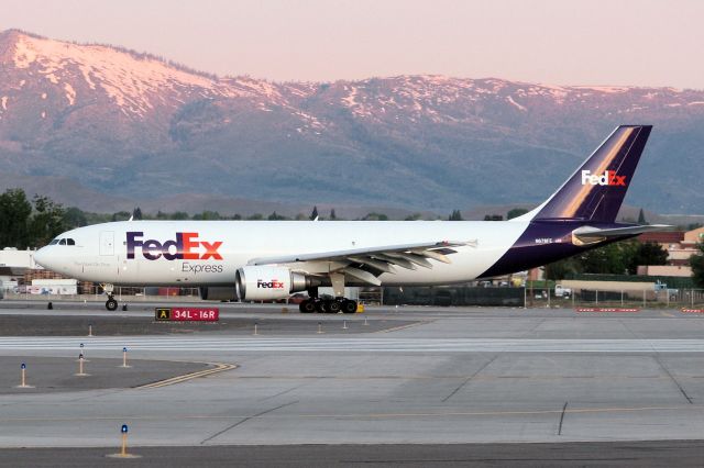 N678FE — - Positioning for a sunrise departure from RTIAs runway 16R.