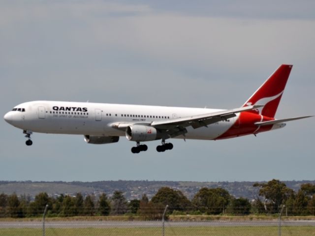VH-ZXC — - About to land on runway 05.