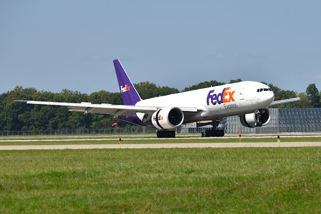 BOEING 777-200LR (N851FD) - Touching down on 5-L 08-20-24 on arrival from ANC.