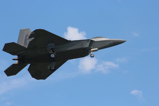 Lockheed F-22 Raptor — - One of the dozen plus F-22's from Langley AFB landing at Volk Field  during Operation Northern Lightning 2 in August.  