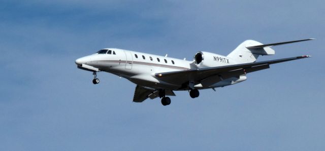 Cessna Citation X (N991TX) - About to touch down is this 2002 Cessna 750 Citation X from the Winter of 2024.