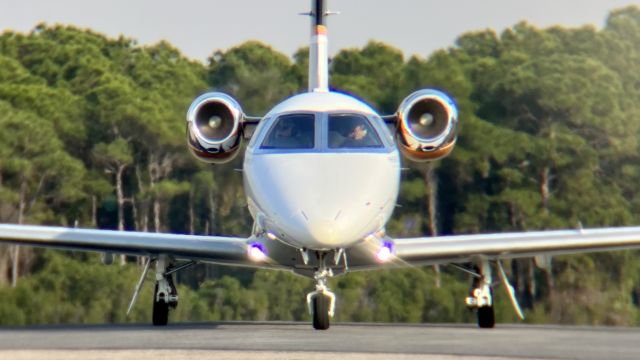 Embraer Phenom 100 (N600HT) - A mini Phenom making a quick stop at Atlantic Aviation Destin. br /br /This aircraft is a 2009 Embraer Phenom 100, SN 500-00036, owned/operated privately. 12/19/22. 