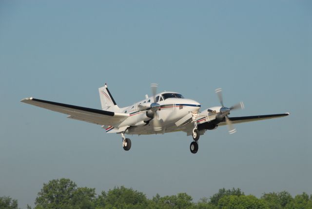 Beechcraft King Air 90 (N278AB) - King Air on take off from SME