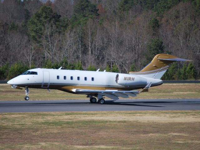 Bombardier Challenger 300 (N1RH) - HENDRICK MOTORSPORTS LLC touching down on runway 20 at KJQF. Its the "Mini-Me" version of N500RH. - 12/14/12