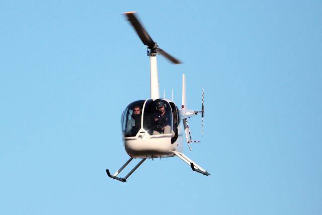 Robinson R-44 (N31197) - Nashvilles News 4 helicopter taking video of a serious multi-car accident on I40. The cameraman is in the left seat pointing his camera at the traffic backed up by the accident. He over flew my car as I waited in traffic.