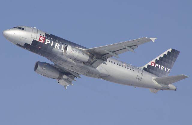 Airbus A319 (N526NK) - Spirit Wings A319 departing Denver in the beautiful winter light.