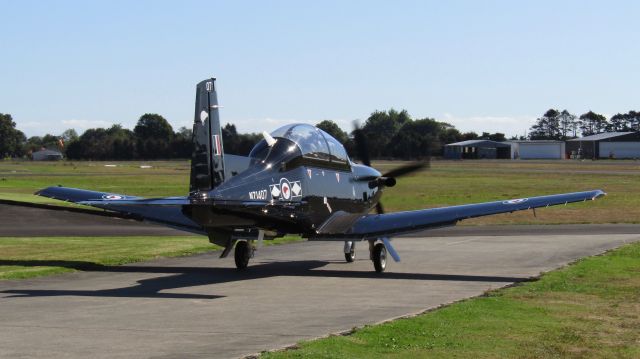 Raytheon Texan 2 (ANZ1407) - Departing Ardmore after a Warbirds display.