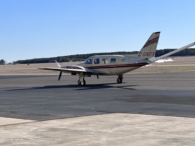 C-GNOV — - Piper PA-13 Navajo taxing to take off from KTXK runway 22.