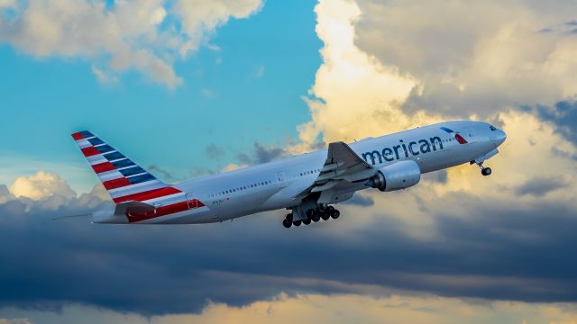 Boeing 777-200 (N767AJ) - American Airlines 777-200 taking off from PHX on 8/24/22. Taken with a Canon 850D and Rokinon 135mm f/2 manual focus lens. 