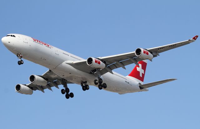 Airbus A340-300 (HB-JMI) - Landing.