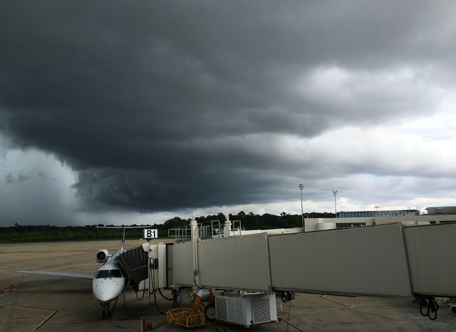 Embraer ERJ-135 (N16149) - Amazing skies over gate B1, Charleston Intl Airport, Charleston, S.C. / photo taken with an iPhone6s