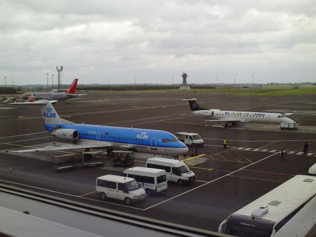 Fokker 70 (PH-KZB) - Also featuring a Star Alliance (BMI Regional) ERJ-145 and a Jet2.com Boeing 757 - Newcastle Airport - 23/05/2011.