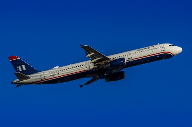 Airbus A321 (N578UW) - An American Airlines A321 in US Airways retro livery taking off from PHX on 1/25/23. Taken with a Canon R7 and Tamron 70-200 G2 lens.