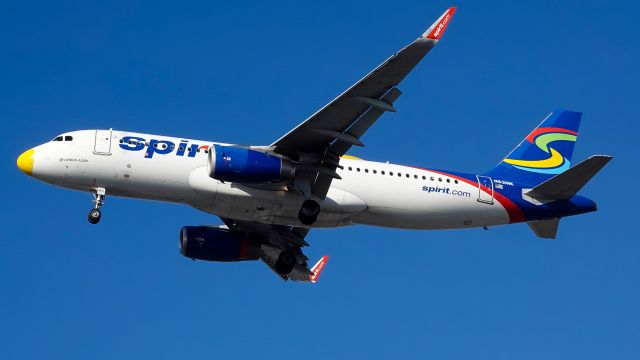 Airbus A320 (N631NK) - One of the last skittle livery Spirit A320's coming into Newark with a mismatched nose.