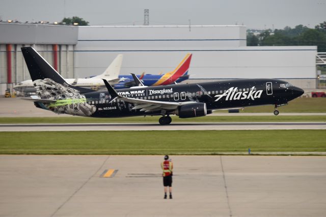 Boeing 737-800 (N538AS) - 5-L 05-28-23. Note the Allegiant ramper grabbing a shot with his cell phone in the foreground.