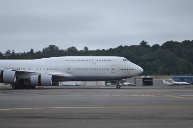 BOEING 747-8 (N6067U) - Taken on the tarmac tour of Boeing Field, which is an option when visiting the Museum of Flight (I HIGHLY recommend it!). As for the aircraft I am not too sure what it is being used for, however it appears to be a partial Lufthansa livery and Experimental is stenciled above the door, it could possibly be part of the Performance Improvement Program for the 747-8.